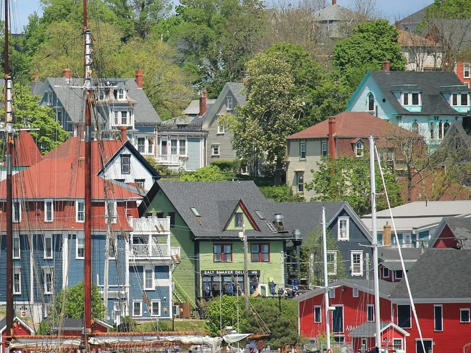 Colourful houses climb the hillside above the harbour in Lunenburg, Nova Scotia.