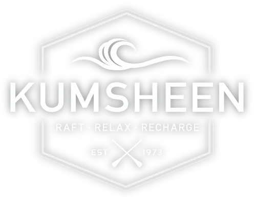 Kumsheen logo. A hexagon badge with a wave, crossed paddles and the words Raft, Relax, Recharge, established 1973.